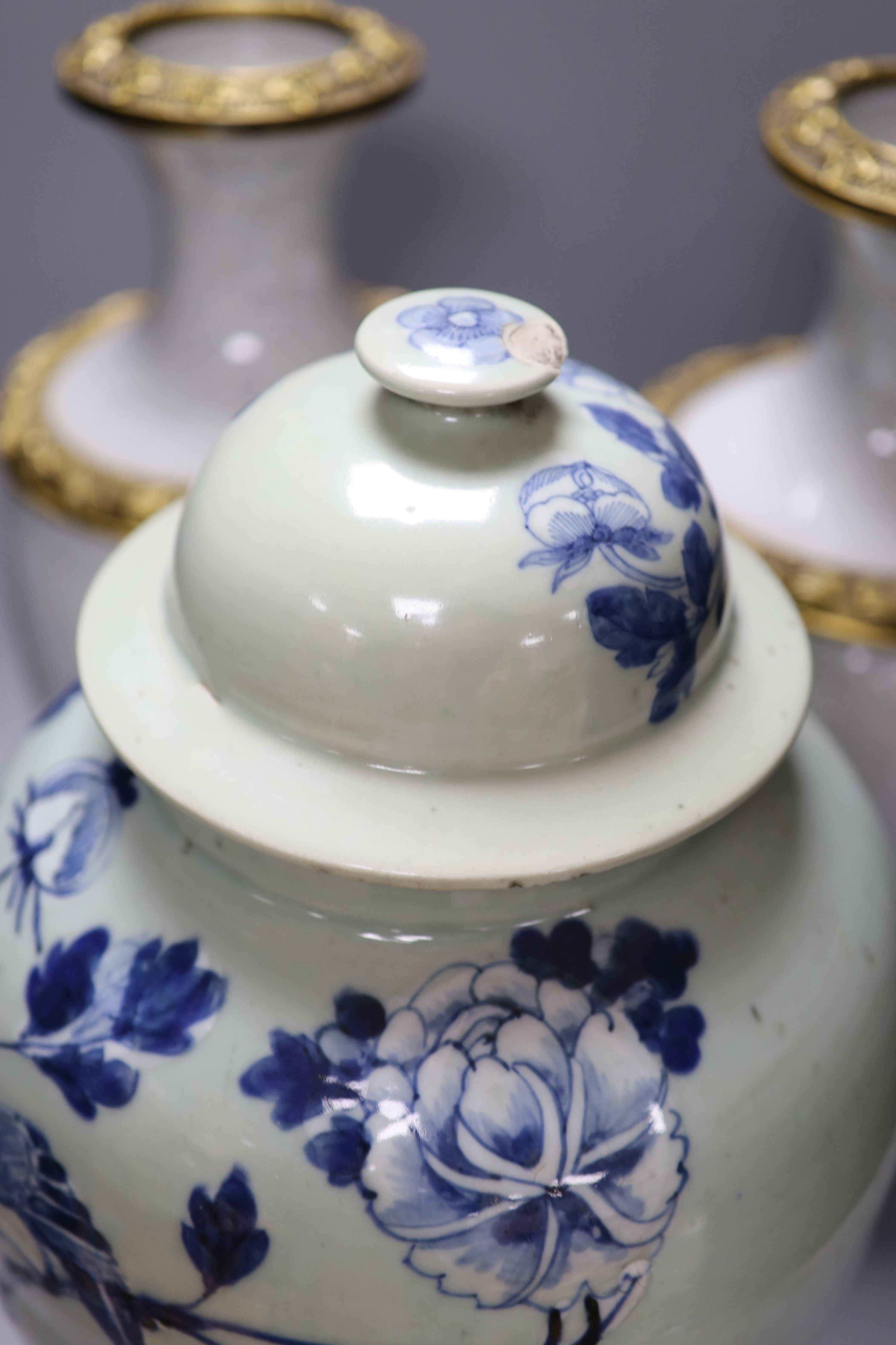 A pair of Chinese crackleglaze vases and a blue and white vase and cover, height 43cm